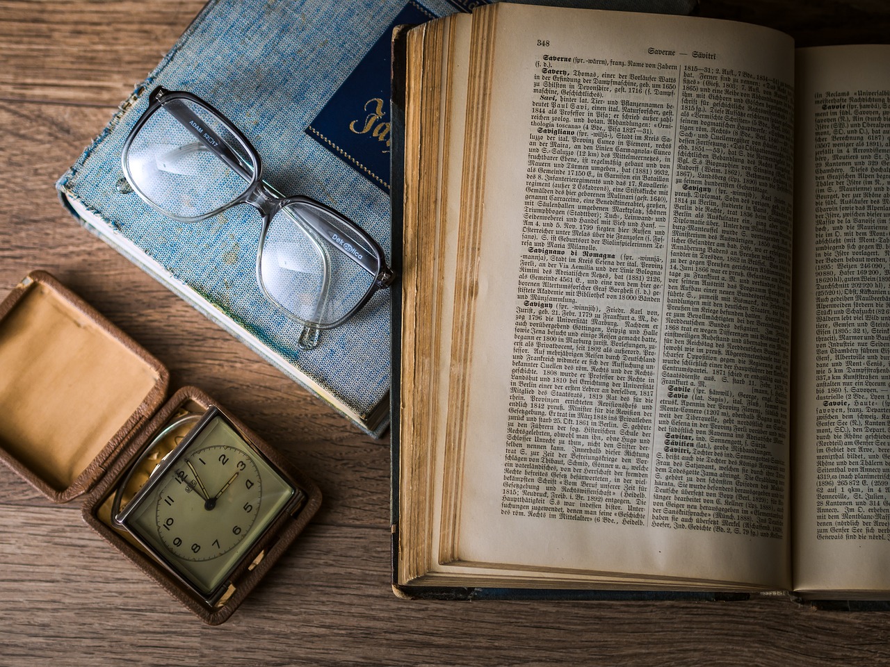 book, glasses, watch