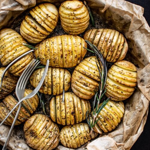 forks on steamed and sliced potatoes