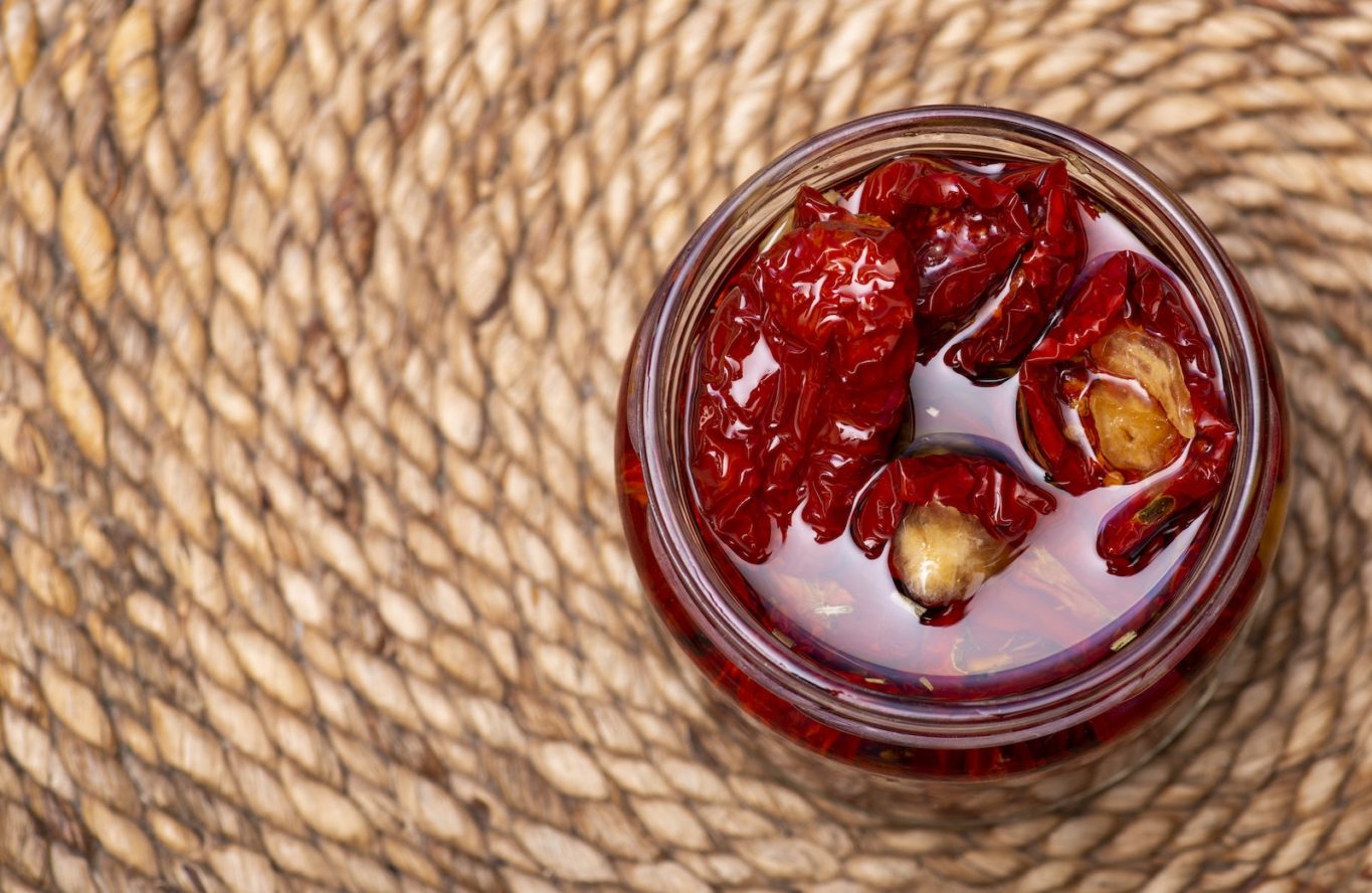 A Close-Up Shot of a Jar of Sun Dried Tomatoes
