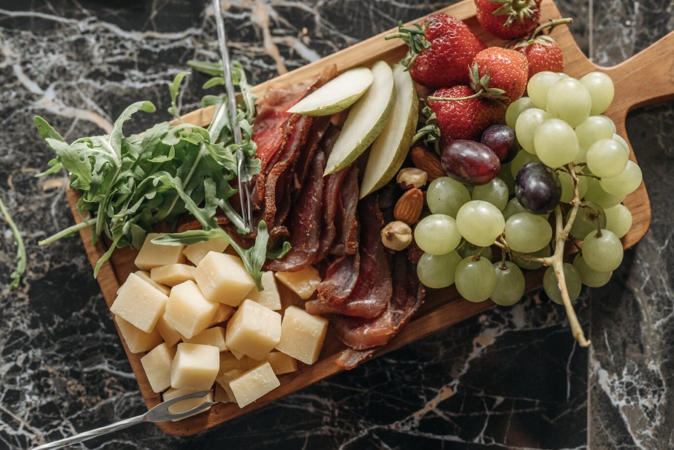 Sliced Fruits on Brown Wooden Tray